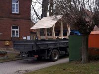 Aufstellen einer überdachten Bank am Bürgerhaus
