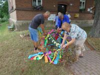 Abschmücken des Maibaums